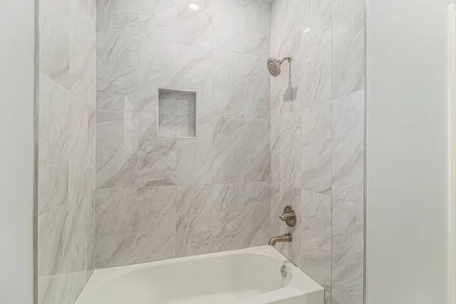 a bathroom with a bathtub