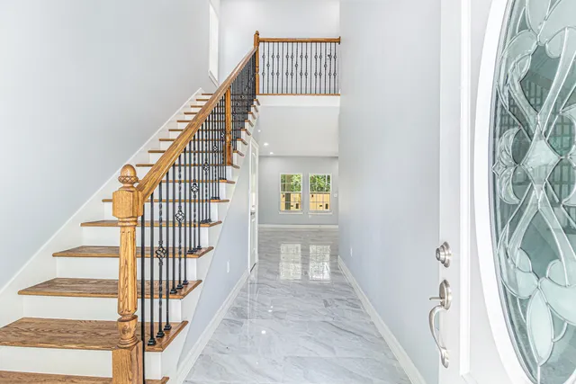 a view of entryway with wooden floor