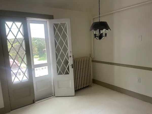 a view of a livingroom with a staircase