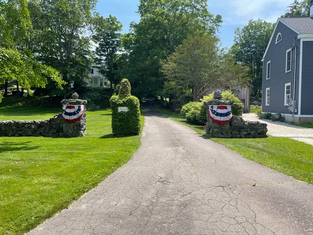 a view of a garden with an outdoor space