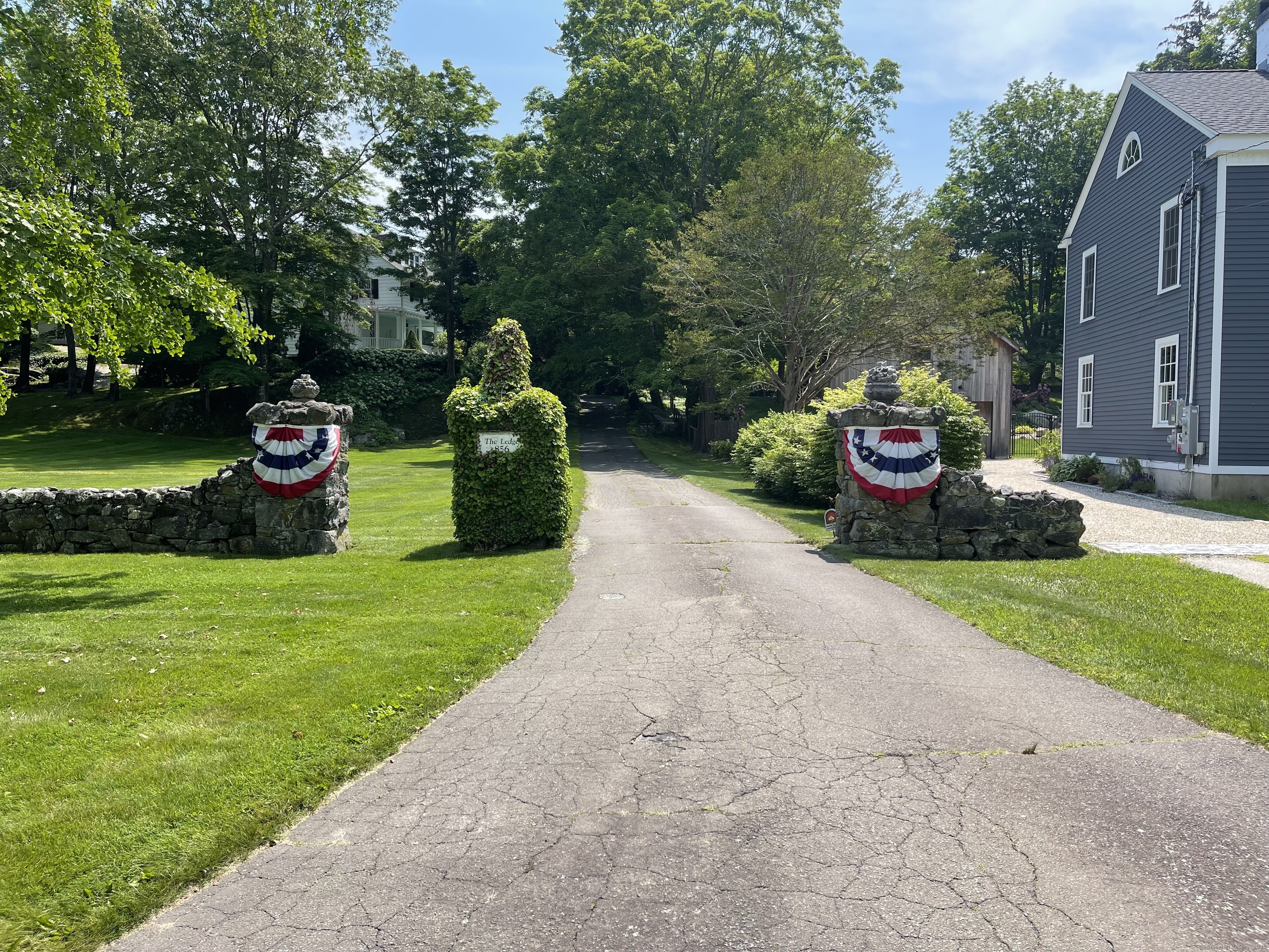 856 Boston Post Road, Unit 1 Madison, CT 06443 - Photo 15 of 25 a view of a garden with an outdoor space