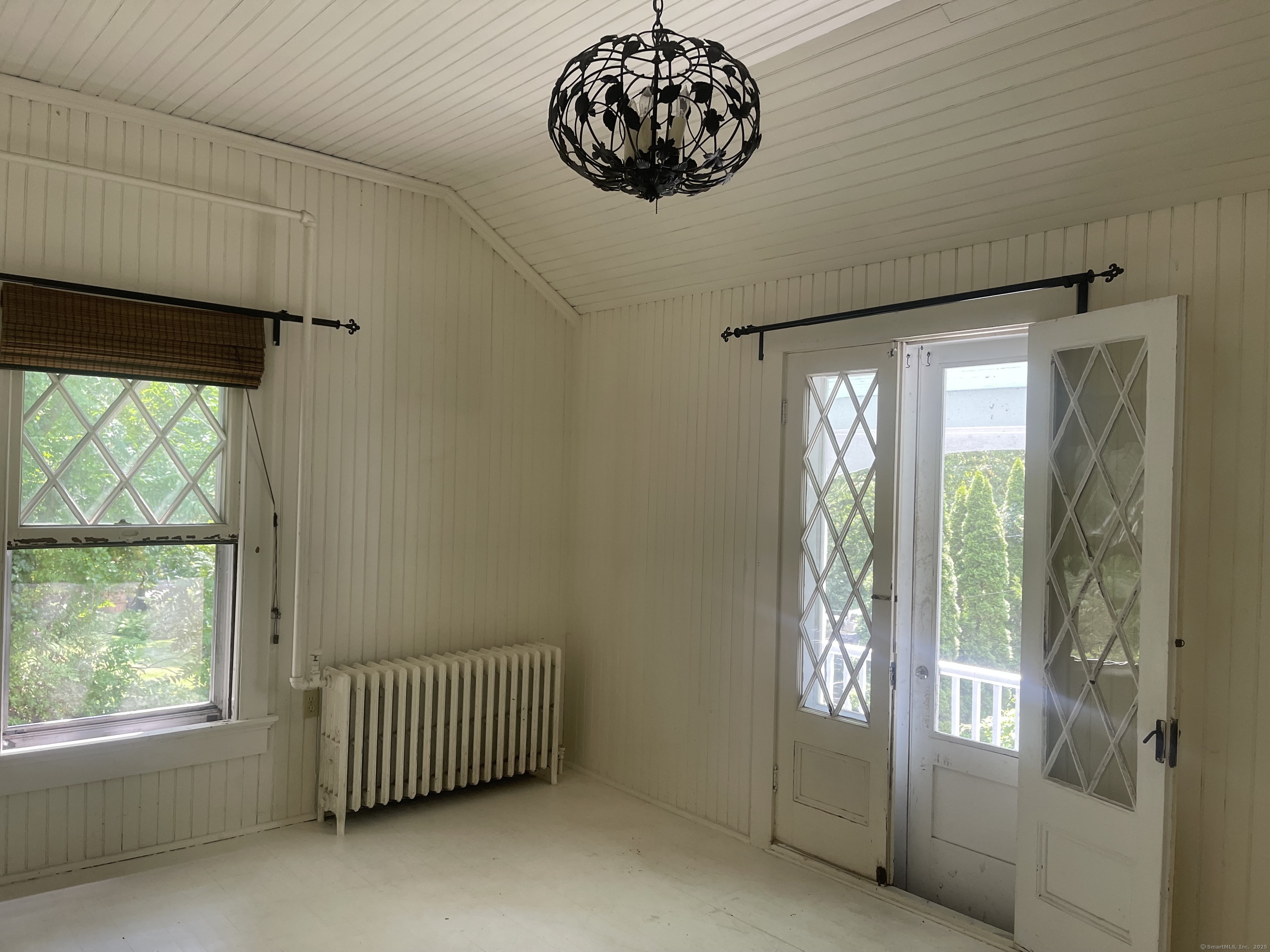 856 Boston Post Road, Unit 1 Madison, CT 06443 - Photo 5 of 25 a view of an empty room with a window