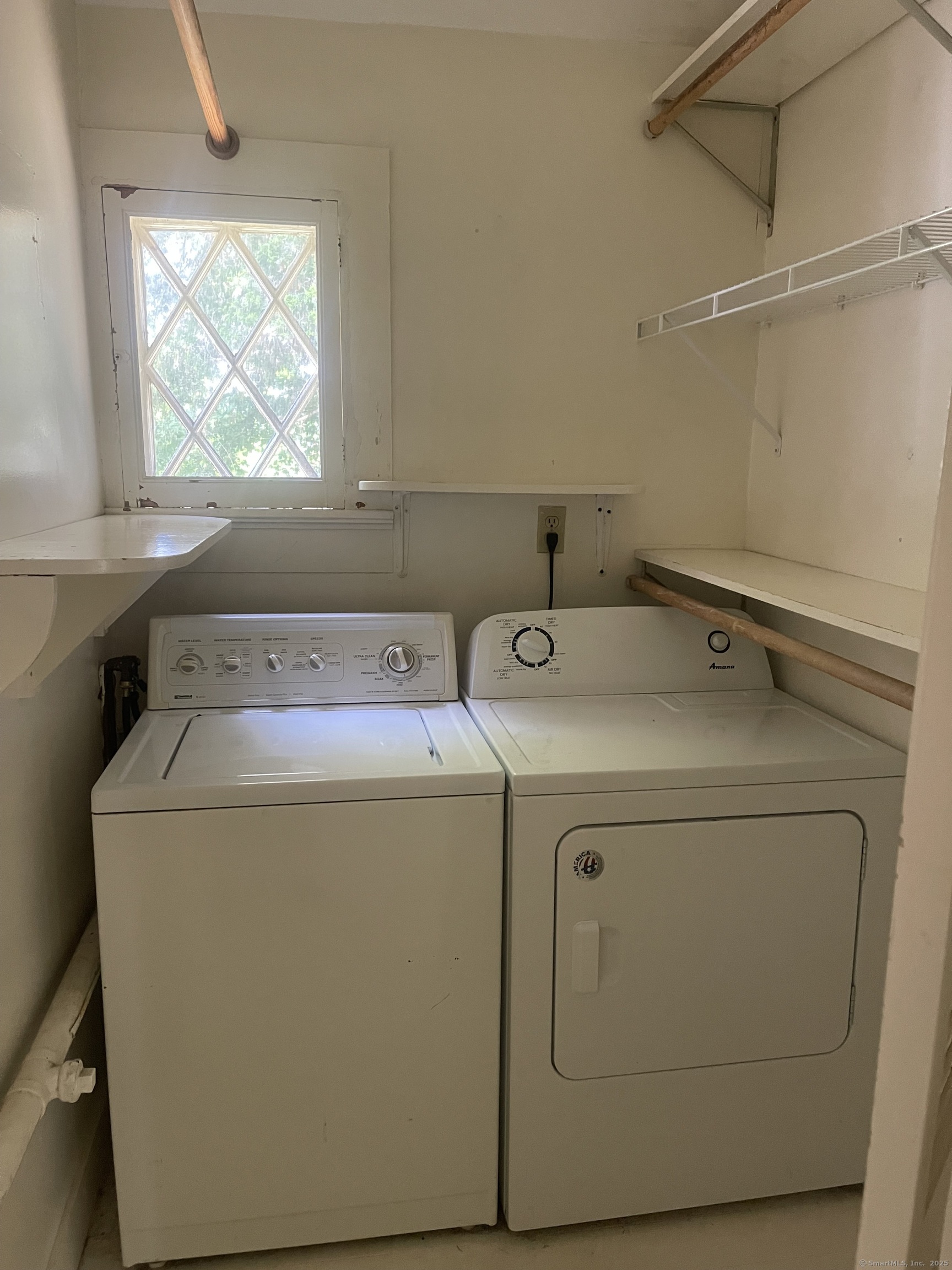 856 Boston Post Road, Unit 1 Madison, CT 06443 - Photo 7 of 25 a utility room with dryer and washer