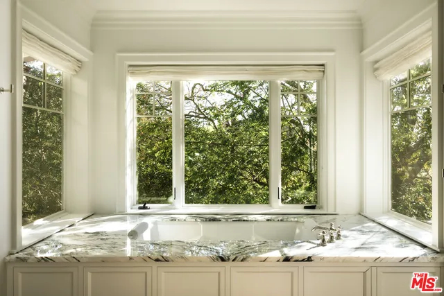 a view of a living room and window