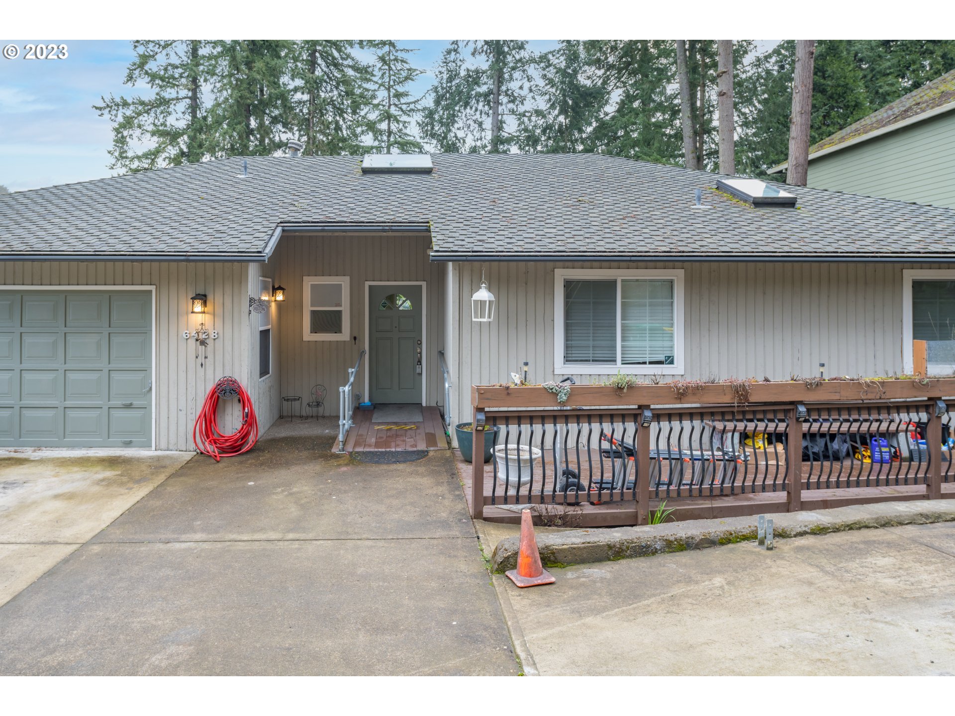 a view of a wooden house with a outdoor space