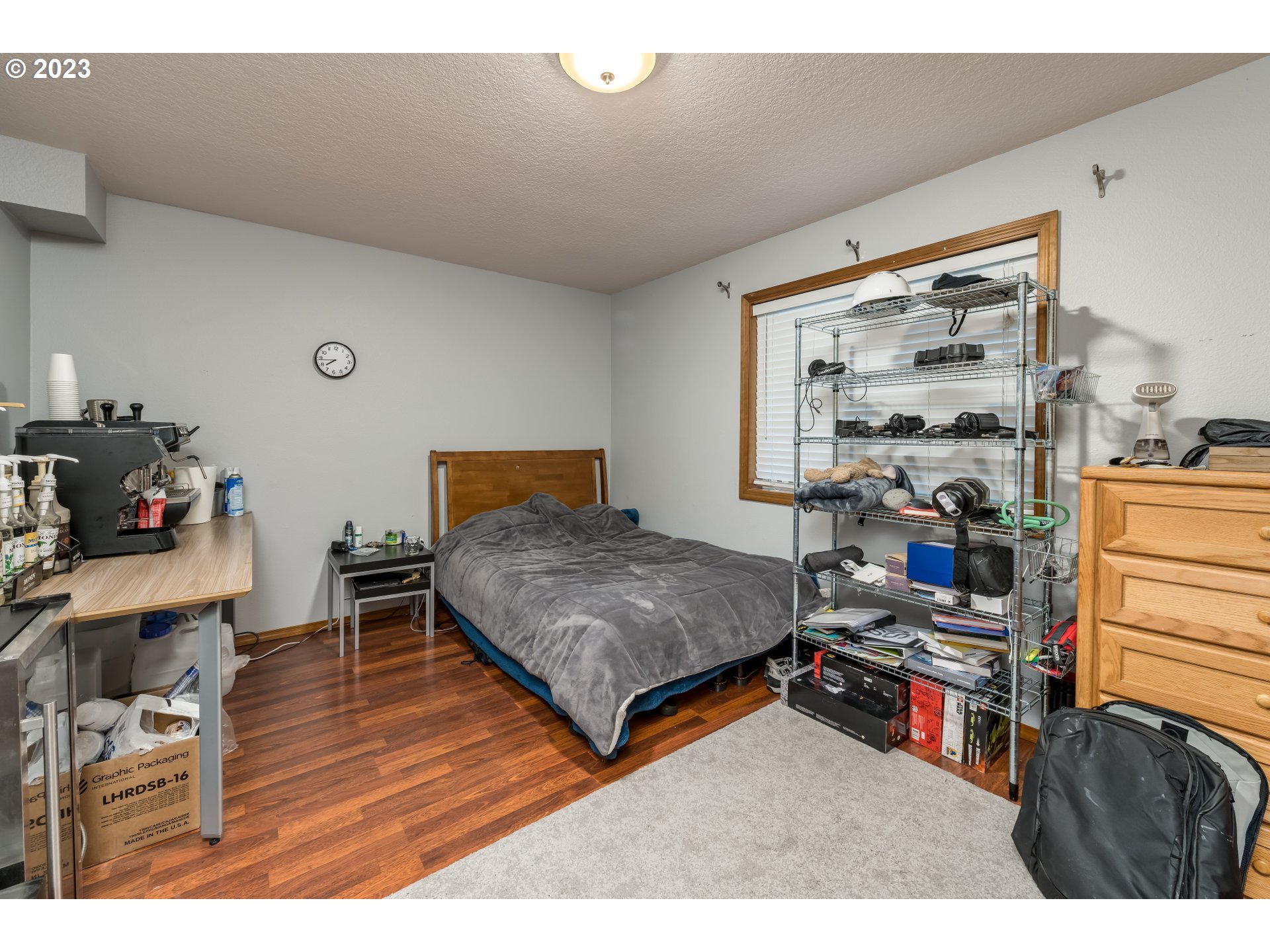6428 Southwest 155th Avenue Beaverton, OR 97007 - Photo 12 of 24 a living room with furniture a flat screen tv and a table