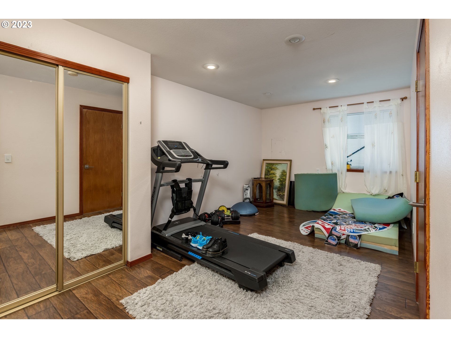6428 Southwest 155th Avenue Beaverton, OR 97007 - Photo 18 of 24 a room with gym equipment