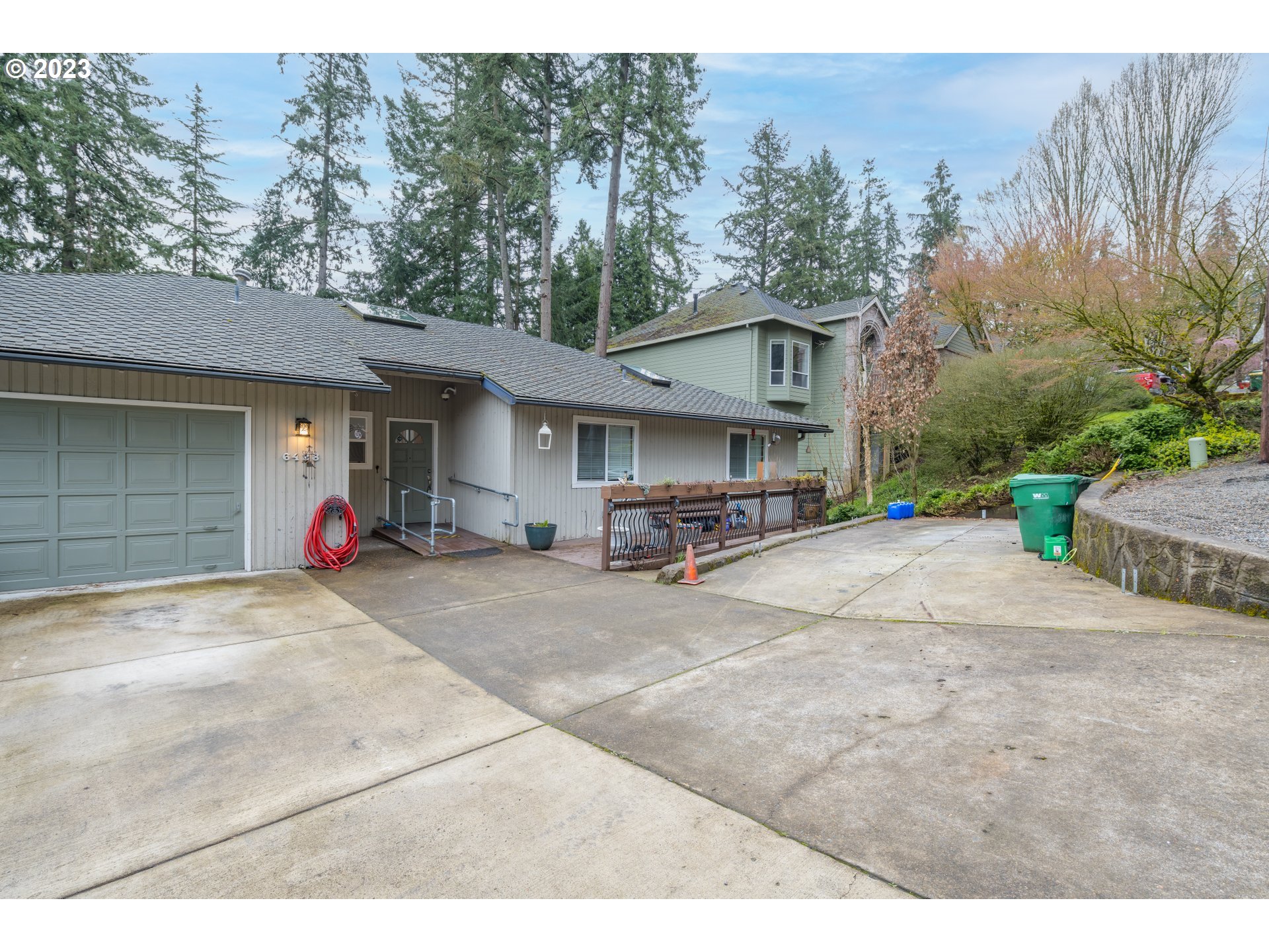 6428 Southwest 155th Avenue Beaverton, OR 97007 - Photo 2 of 24 a view of a house with a outdoor space and yard
