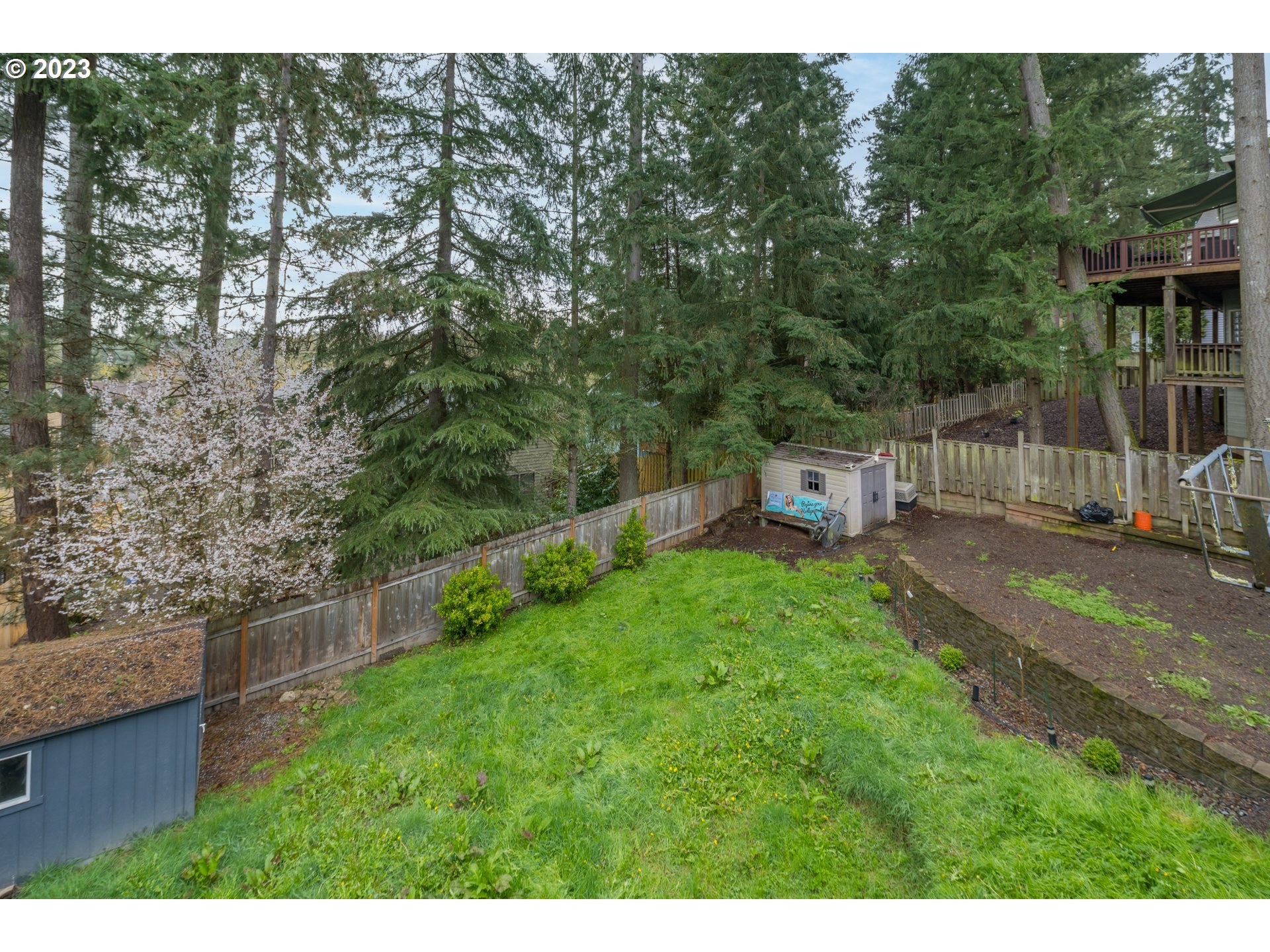 6428 Southwest 155th Avenue Beaverton, OR 97007 - Photo 22 of 24 a house view with a garden space