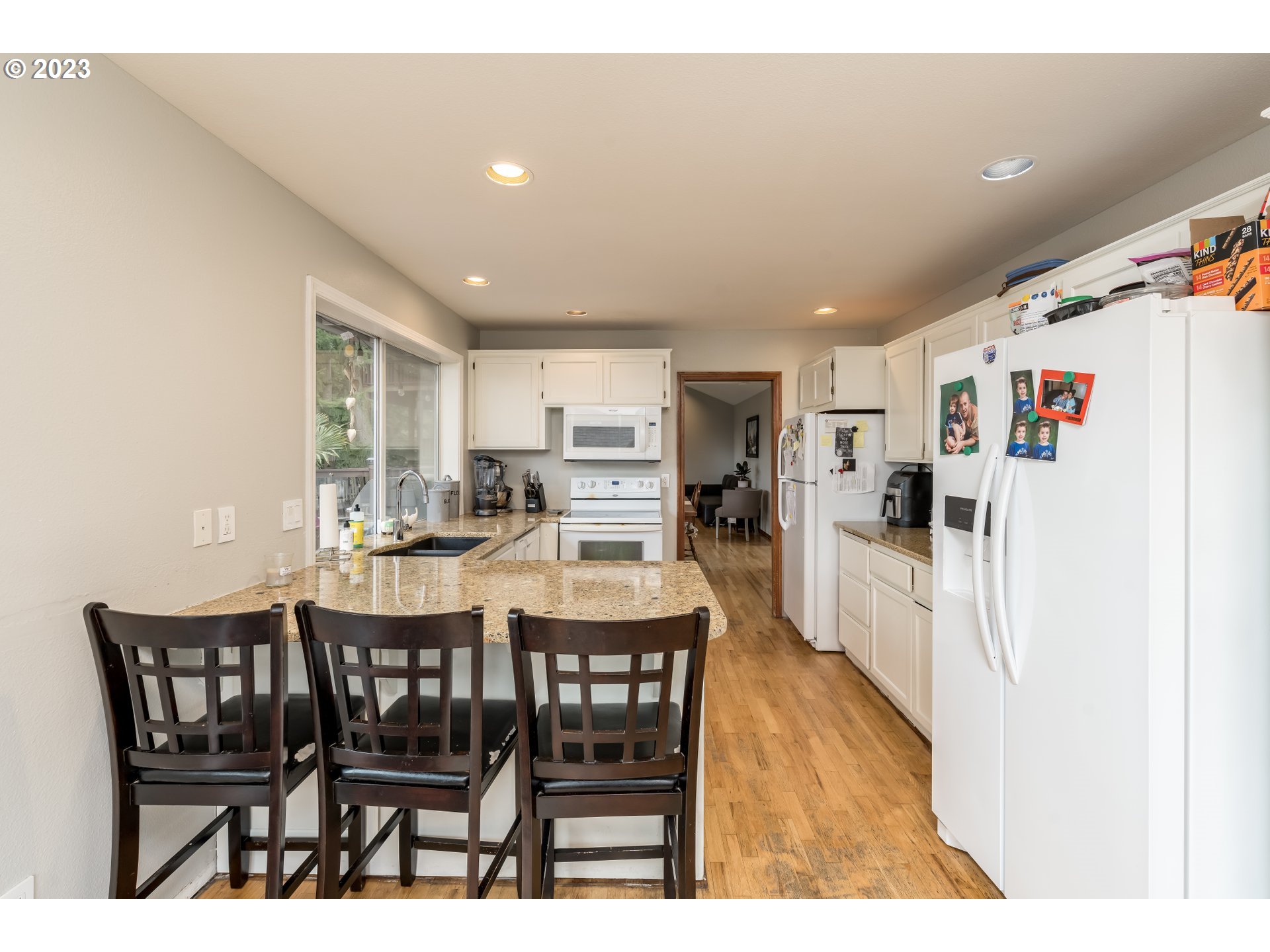 6428 Southwest 155th Avenue Beaverton, OR 97007 - Photo 4 of 24 a dining room with furniture and window
