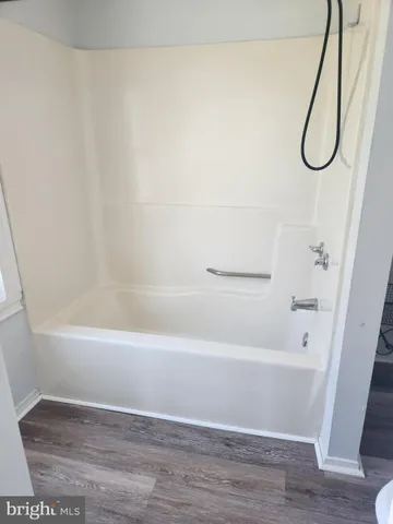 a bathroom with a bathtub