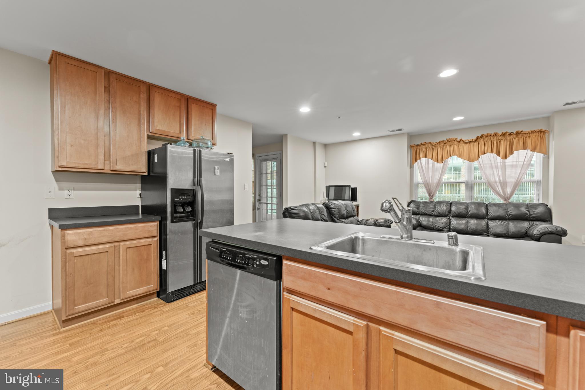 9510 Coyle Road, Unit 201 Owings Mills, MD 21117 - Photo 13 of 34 Kitchen looking into family room