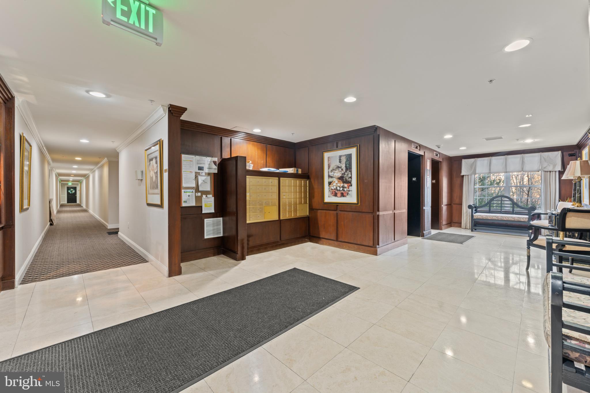 9510 Coyle Road, Unit 201 Owings Mills, MD 21117 - Photo 4 of 34 Lobby hallway, mail, and elevators