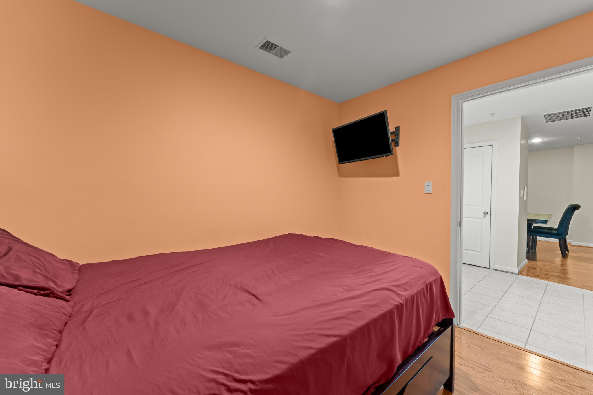 9510 Coyle Road, Unit 201 Owings Mills, MD 21117 - Photo 7 of 34 2nd bedroom looking into main living space