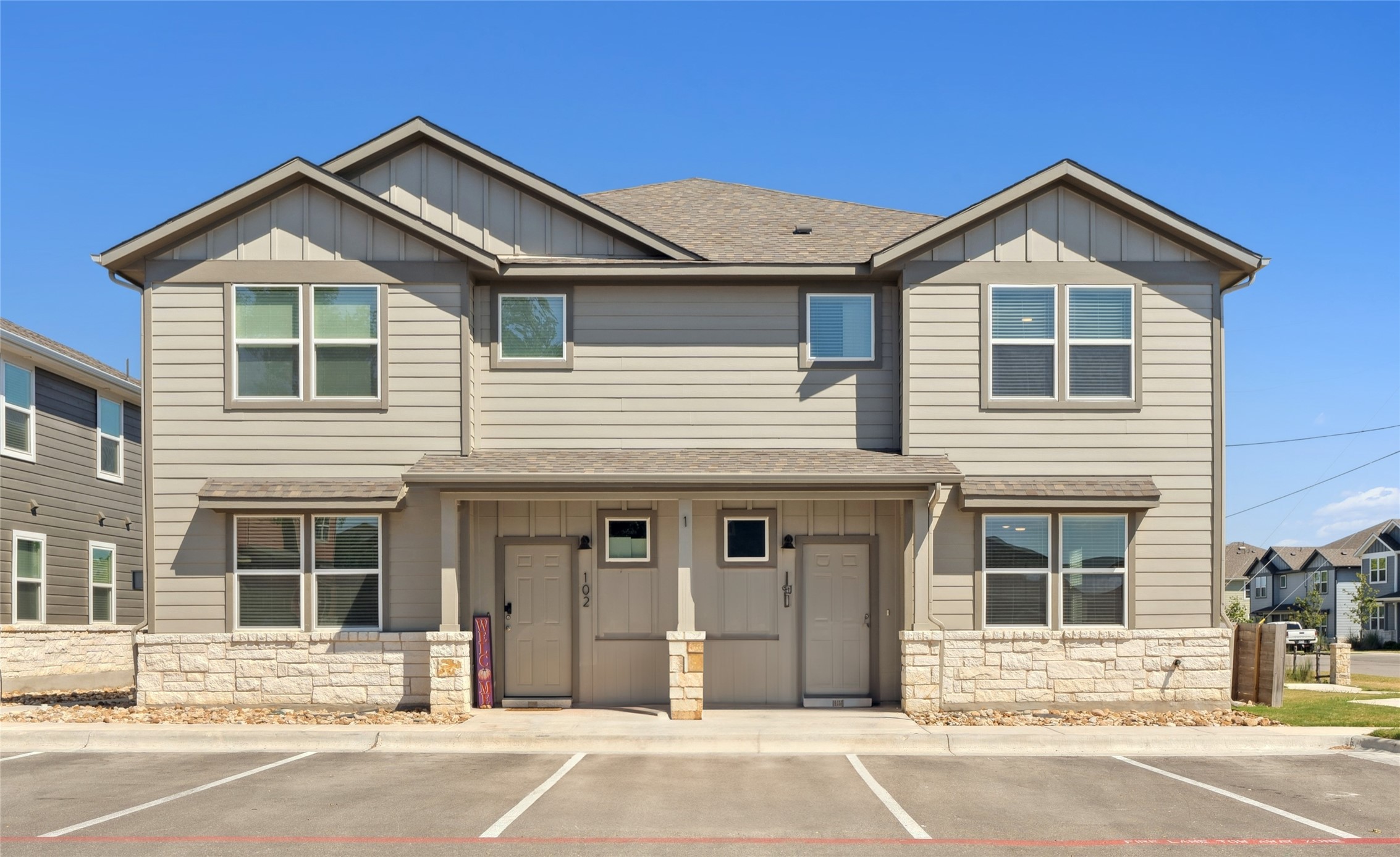 520 Powell Drive Leander, TX 78641 - Photo 30 of 32 a front view of a house with a yard