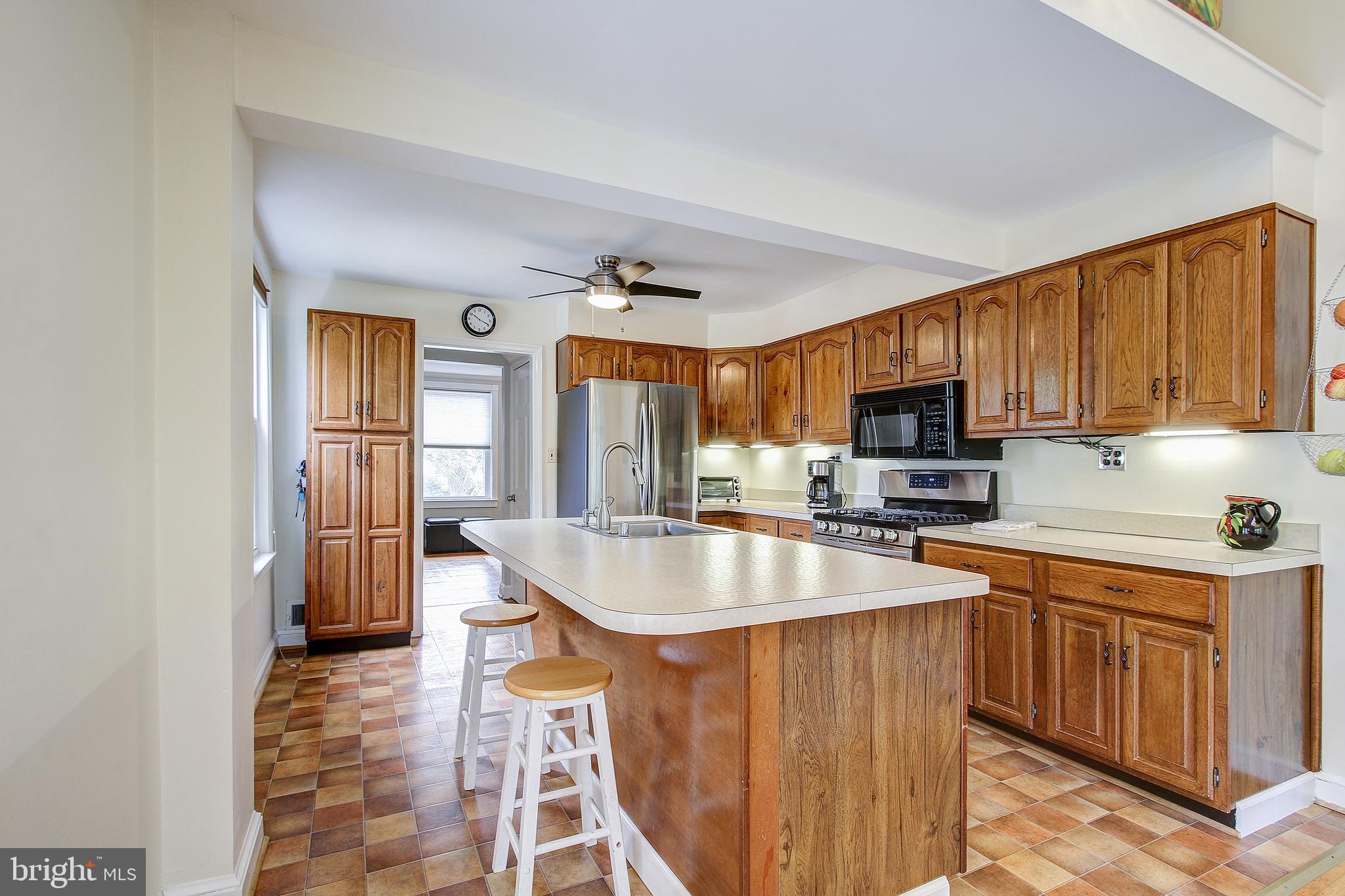 9124 Bradford Road Silver Spring, MD 20901 - Photo 14 of 25 Kitchen with large island.