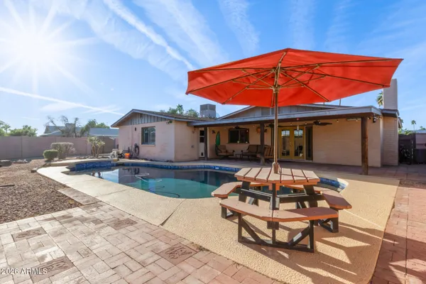a outdoor space with pool and furniture