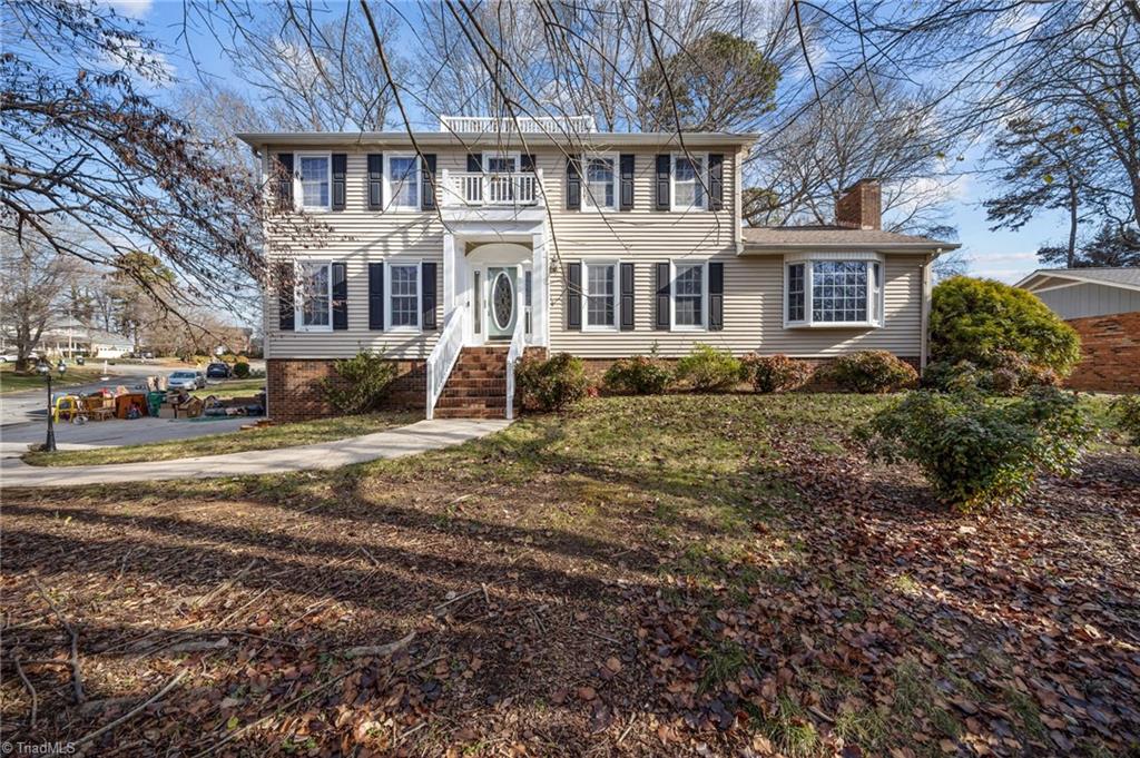 Front view of the home at 1706 Lazy Lane, High Point, NC 27265.