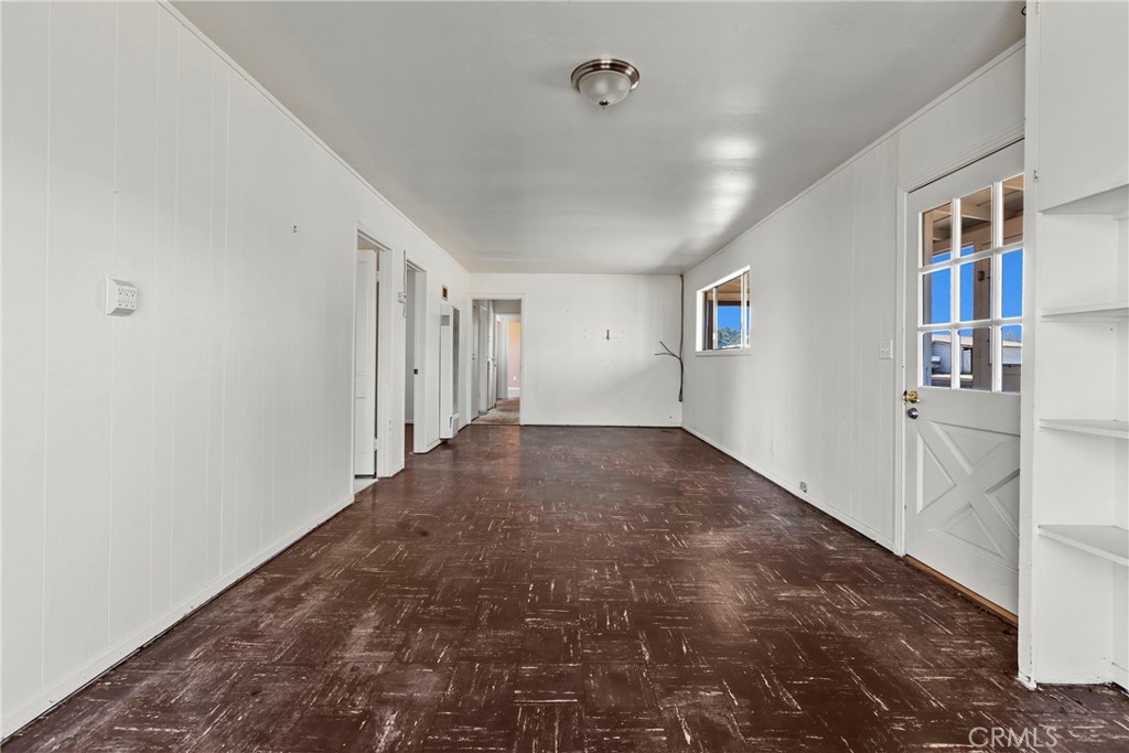 117 West El Campo Road Arroyo Grande, CA 93420 - Photo 11 of 43 a view of empty room with wooden floor