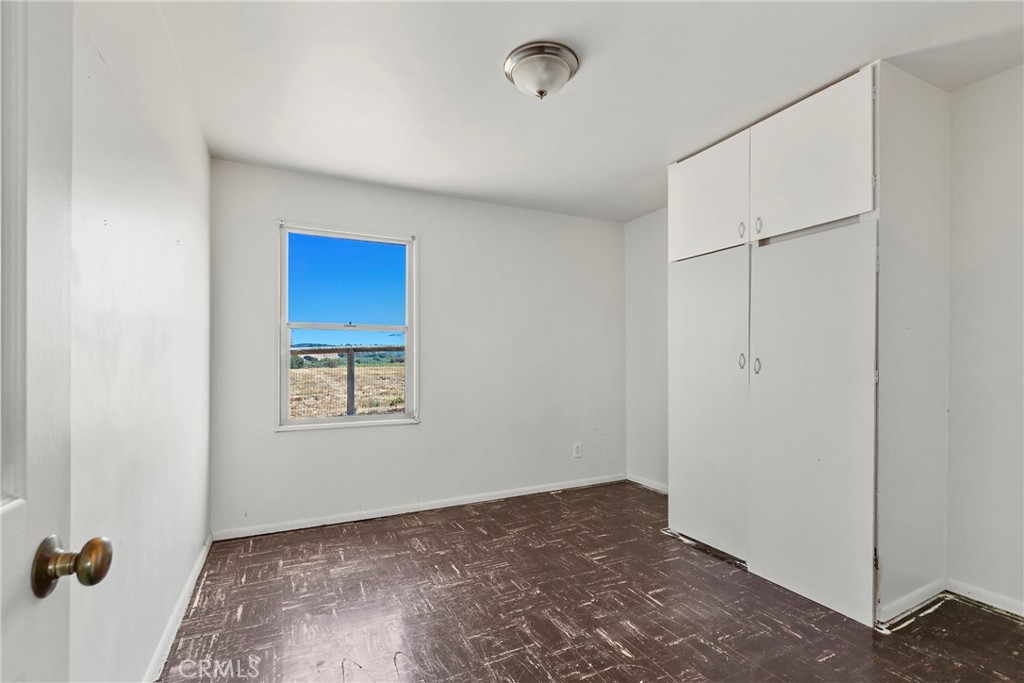 117 West El Campo Road Arroyo Grande, CA 93420 - Photo 19 of 43 a view of an empty room with a window