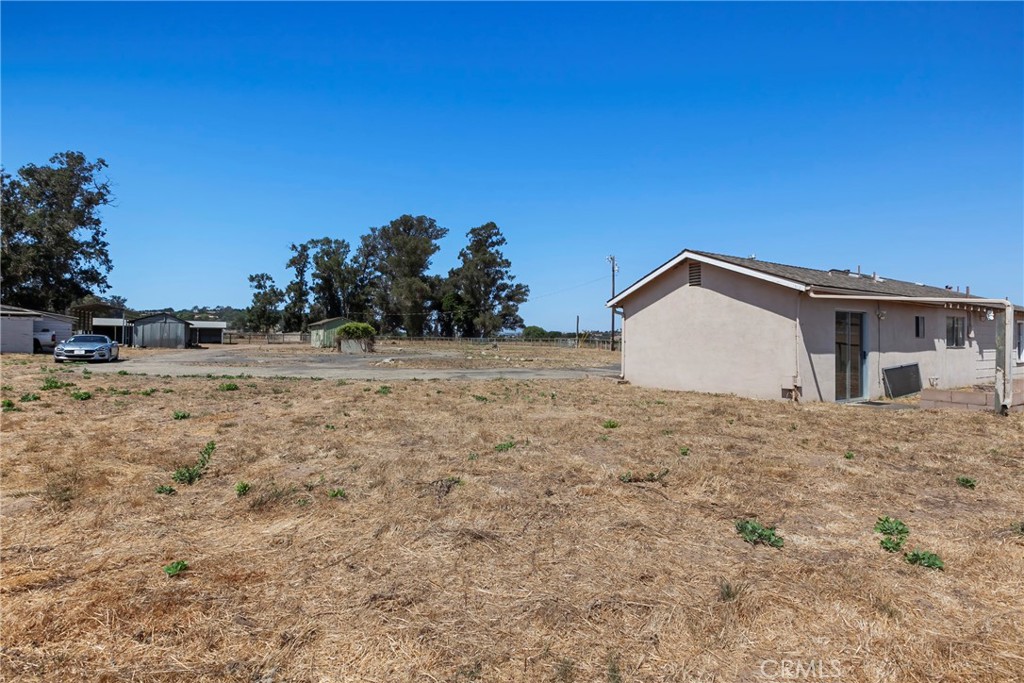 117 West El Campo Road Arroyo Grande, CA 93420 - Photo 36 of 43 a house with trees in the background