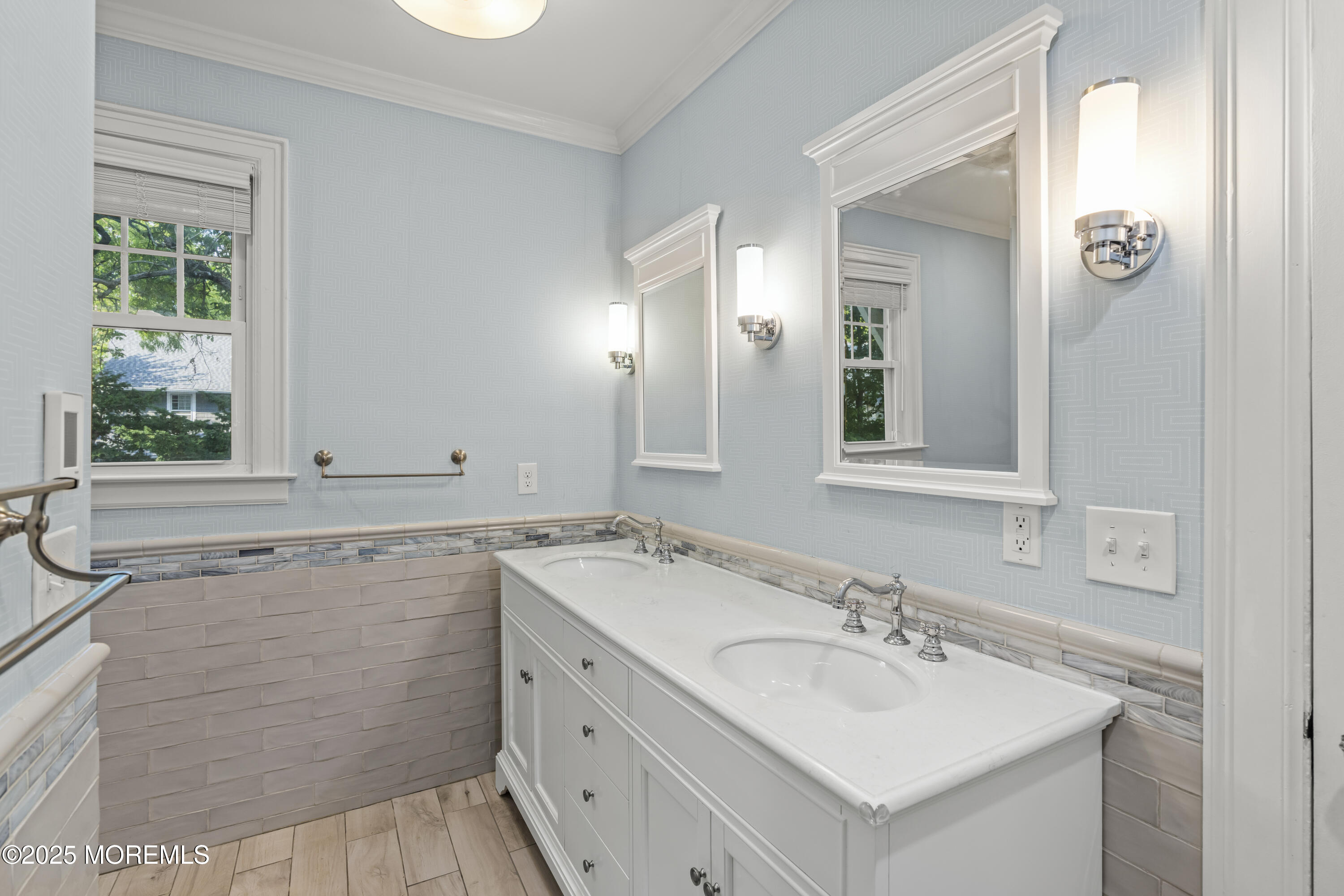 7 Fleming Terrace Maplewood, NJ 07040 - Photo 41 of 72 a bathroom with a sink and a mirror