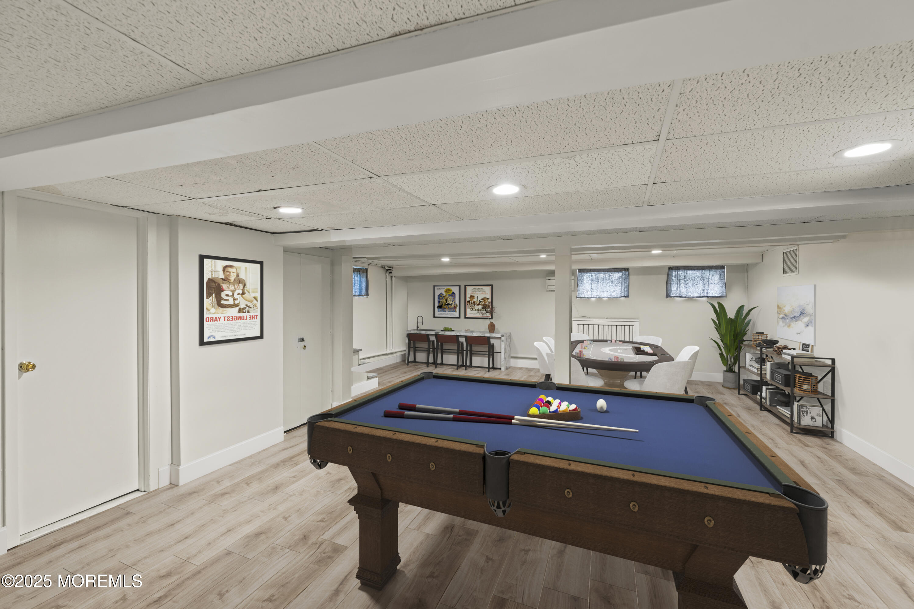 7 Fleming Terrace Maplewood, NJ 07040 - Photo 52 of 72 a living room with furniture pool table and potted plant