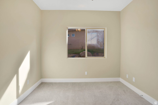 1570 South Rio Virgin Drive Washington, UT 84780 - Photo 46 of 71 Spare room featuring carpet floors and baseboards