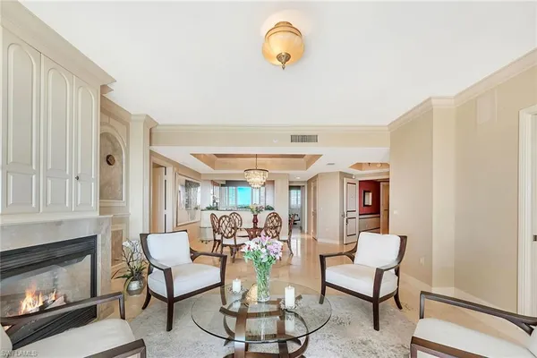 a view of a livingroom with furniture and a fireplace