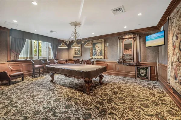 a living room with a couch and a table