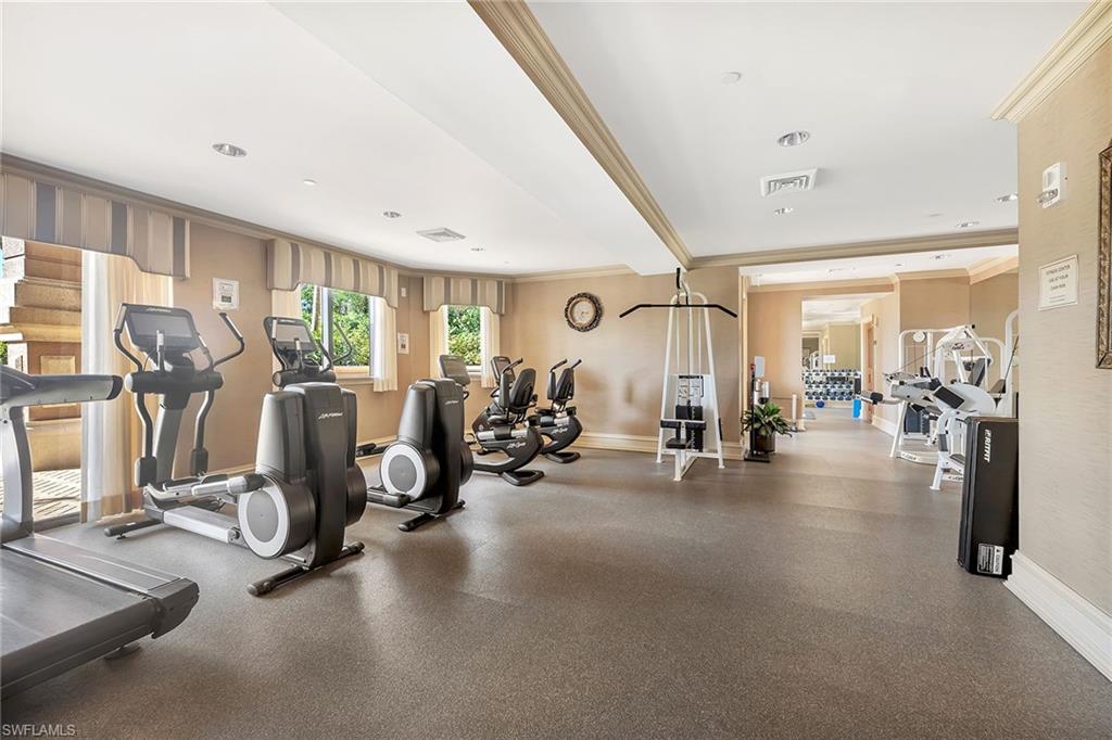 6597 Nicholas Boulevard, Unit 1002 Naples, FL 34108 - Photo 32 of 41 a view of a room with gym equipment