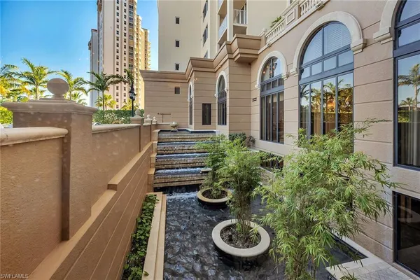 a view of a street with sitting area