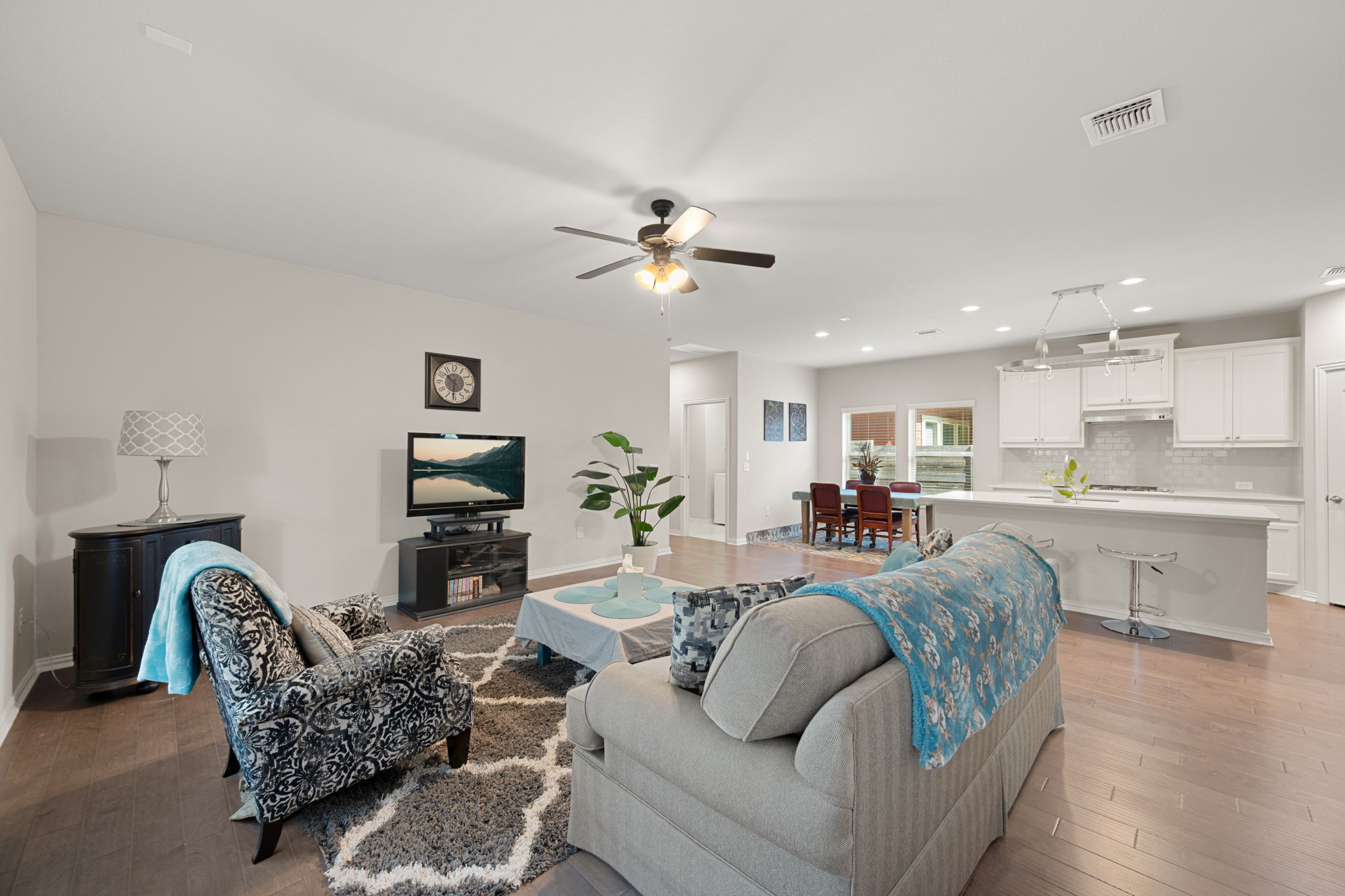 8800 Slater Drive Austin, TX 78747 - Photo 11 of 40 a living room with furniture and a view of kitchen