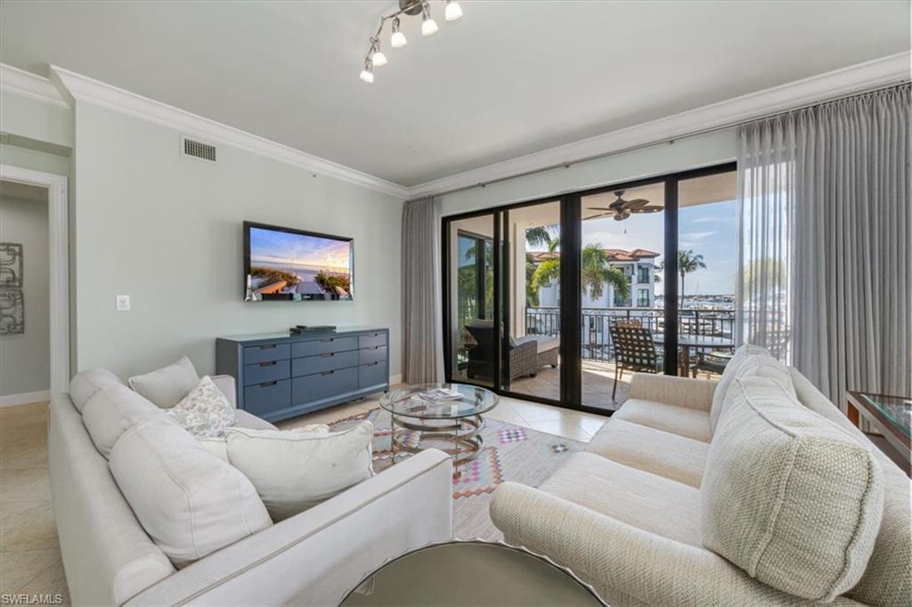 1490 5th Avenue South, Unit 200B Naples, FL 34102 - Photo 10 of 43 Living area with view of Naples Bay