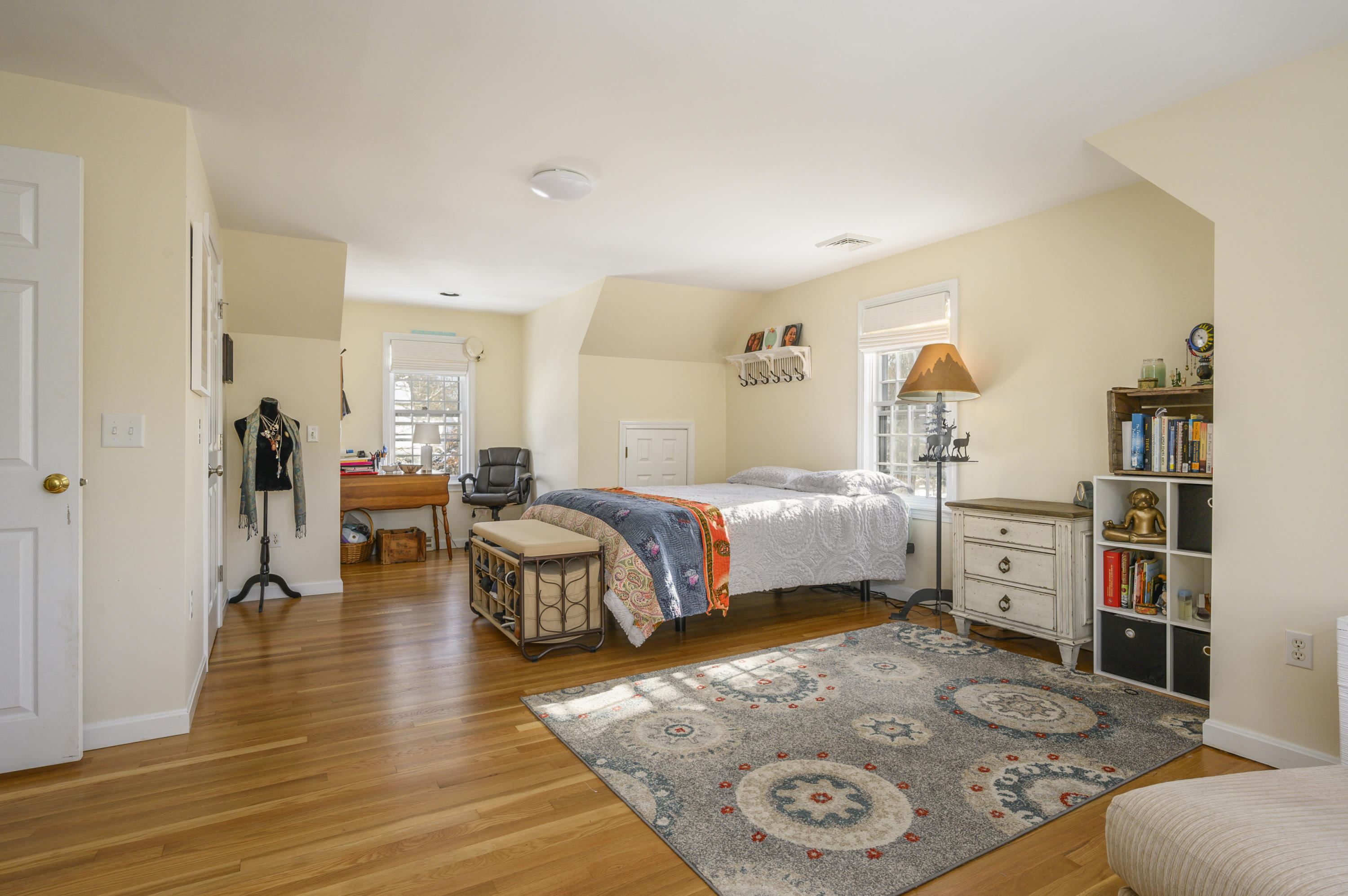 8 Ruth Lane Harwich, MA 02645 - Photo 12 of 20 a bedroom with furniture and a wooden floor