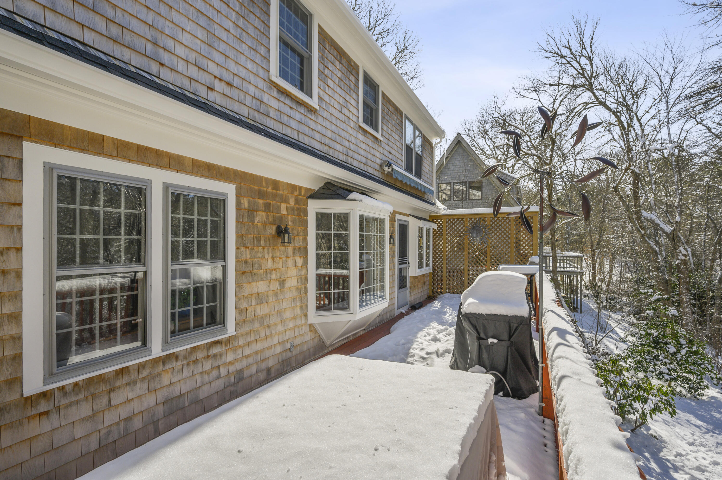 8 Ruth Lane Harwich, MA 02645 - Photo 8 of 20 a view of a house with backyard and sitting area