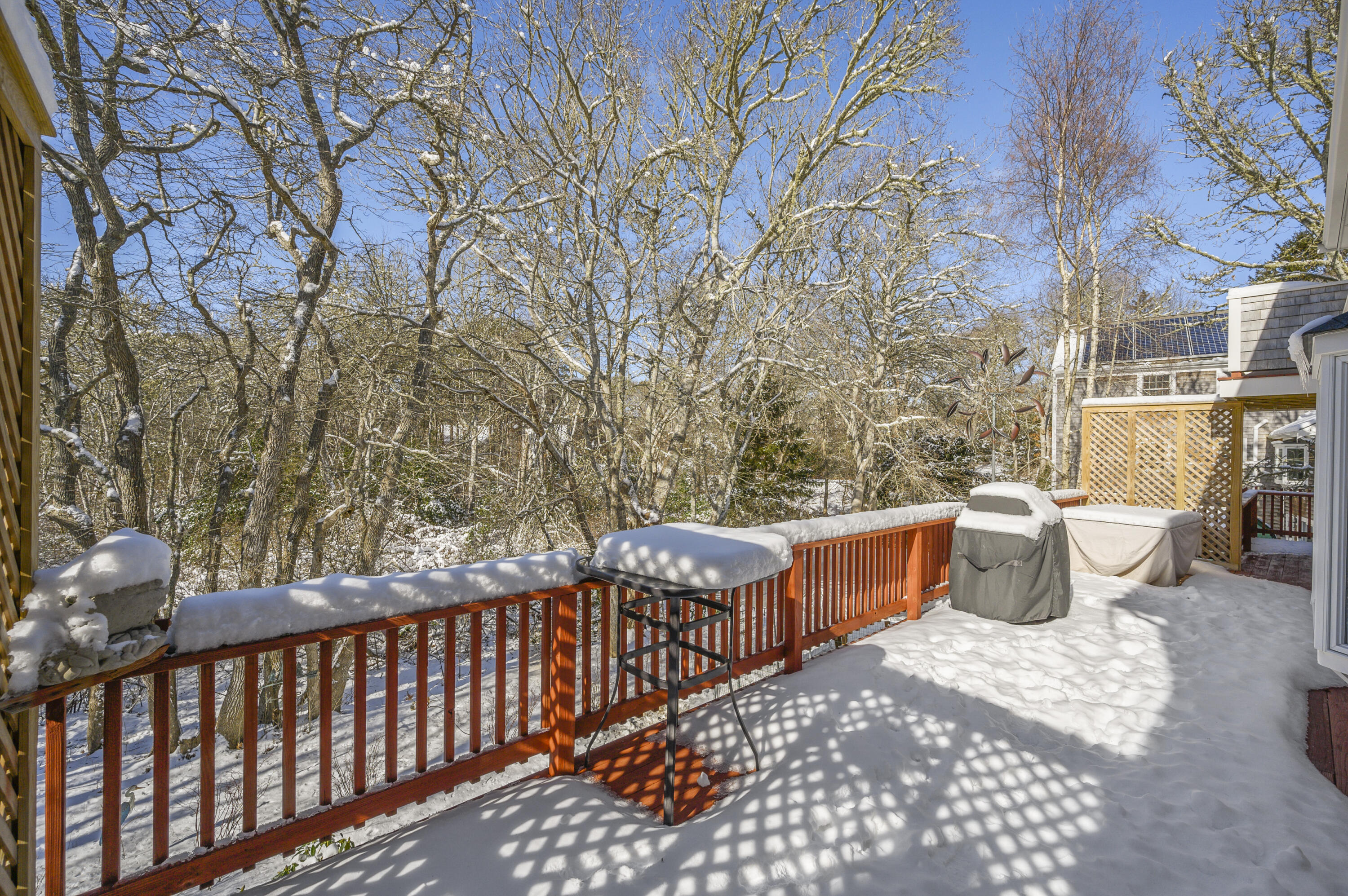 8 Ruth Lane Harwich, MA 02645 - Photo 9 of 20 a view of a chairs and table in the balcony