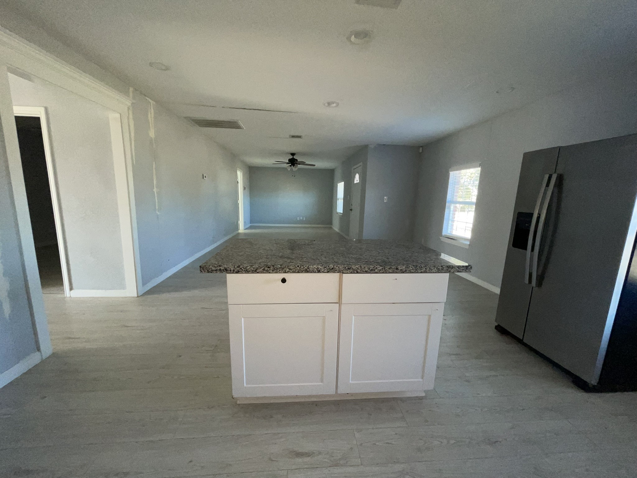 17202 Sunshine Street Houston, TX 77049 - Photo 9 of 19 a view of a hallway to a kitchen