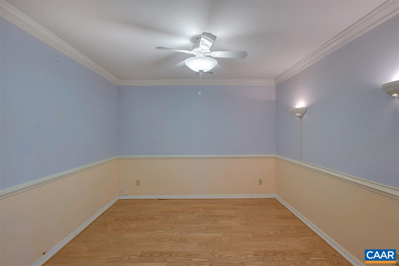 4753 Clover Ridge Court Charlottesville, VA 22901 - Photo 12 of 24 a view of an empty room with a ceiling fan