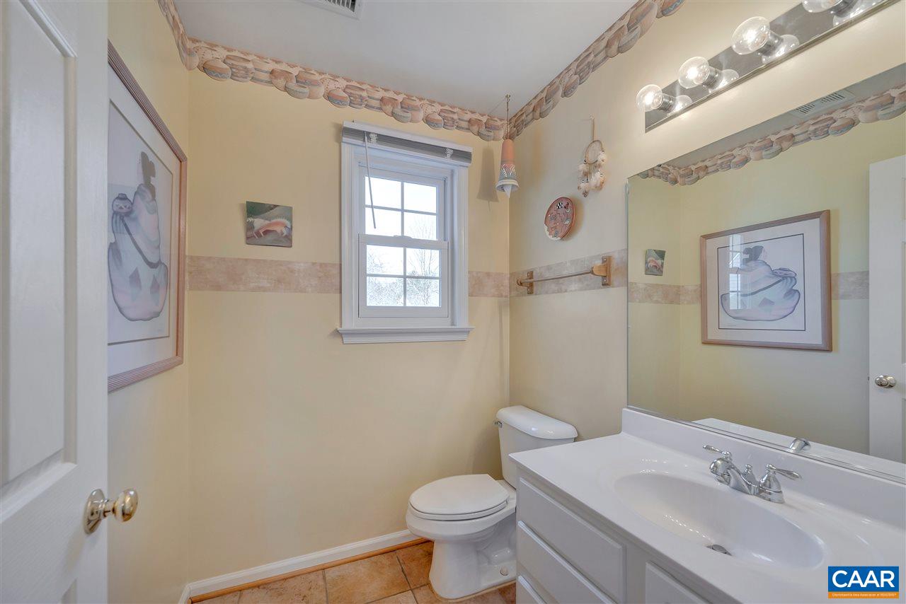 4753 Clover Ridge Court Charlottesville, VA 22901 - Photo 13 of 24 a bathroom with a sink toilet and window
