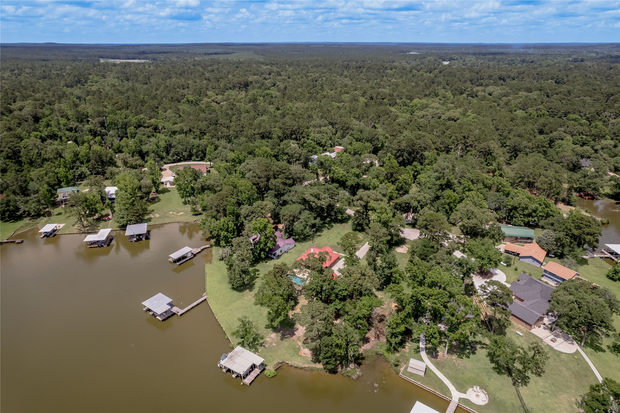 324 Red Oak Lane Trinity, TX 75862 - Photo 47 of 49 an aerial view of residential house with outdoor space and trees around