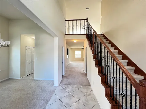 a view of hallway with stairs