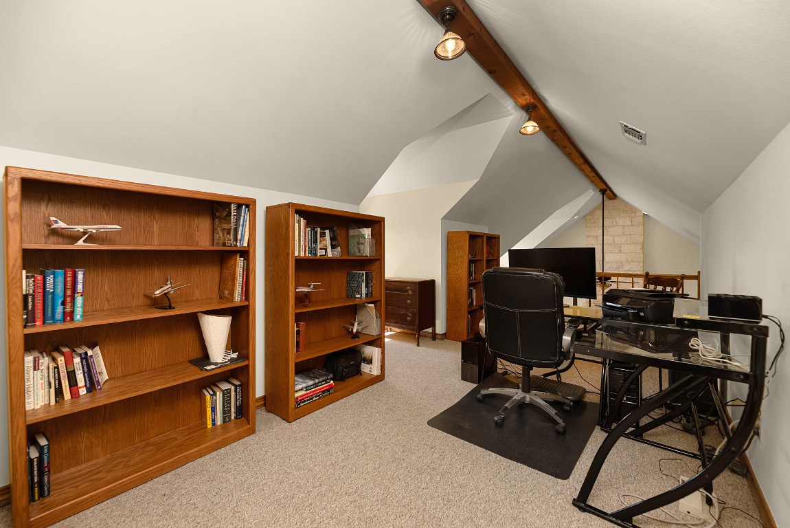 1546 Cox Road Blanco, TX 78606 - Photo 20 of 40 a view of a workspace with furniture