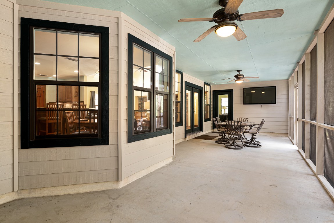 1546 Cox Road Blanco, TX 78606 - Photo 22 of 40 a view of a livingroom with furniture and a ceiling fan