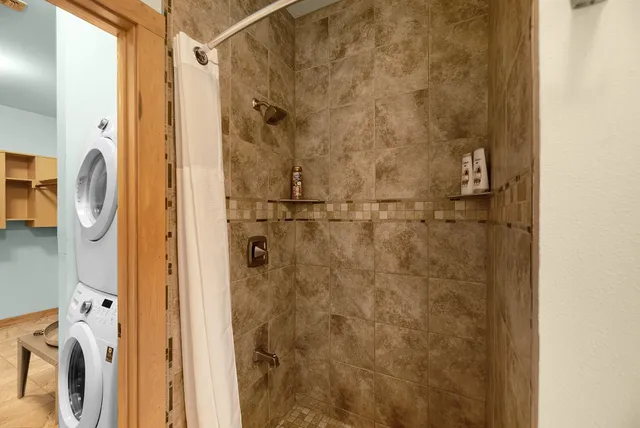 a bathroom with a toilet and a vanity