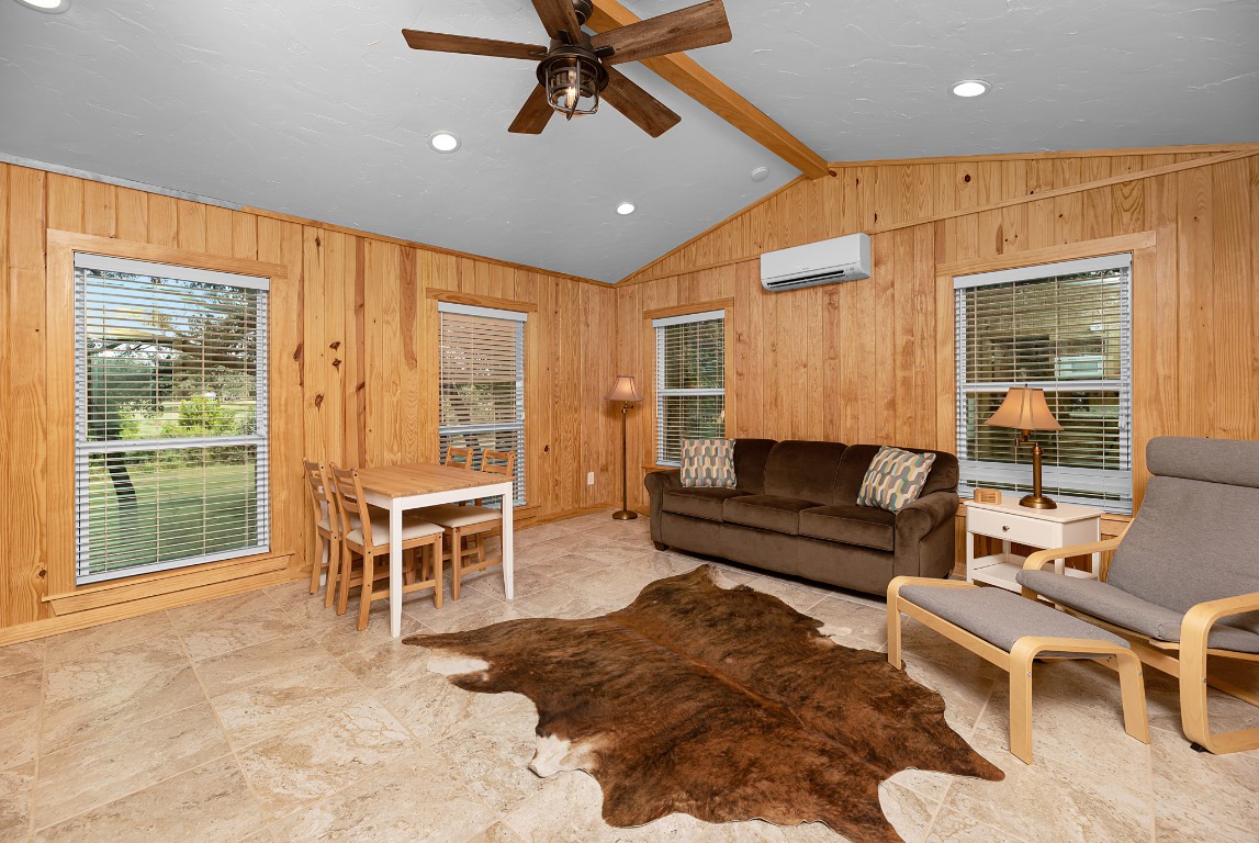 1546 Cox Road Blanco, TX 78606 - Photo 30 of 40 a living room with furniture and a window