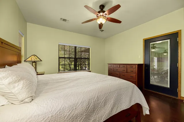 an aerial view of a house with outdoor space