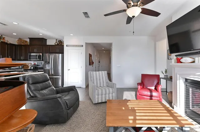 a kitchen with a table and chairs in it