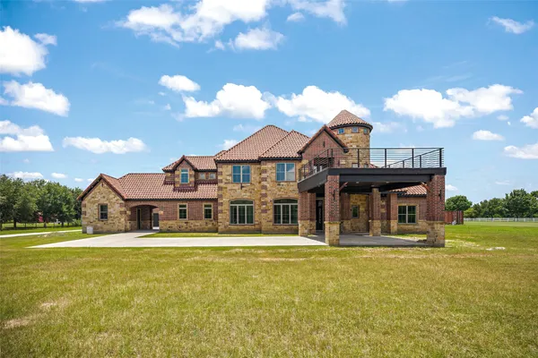 a view of a house with a swimming pool