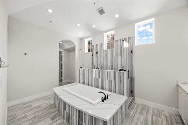a bathroom with a sink and a tub